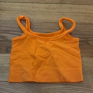 Orange crop top from Amazon, worn once in Disney. Women’s size small
